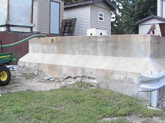 Corroded brine tank; spalding concrete