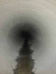 View down concrete culvert pipe lined w/ ML-72HP mortar