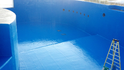Empty pool lined with Madewell's laminate lining system