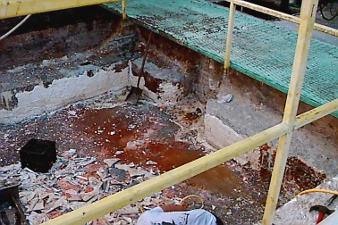 Deteriorated Juice Bowl Plant structure with debris